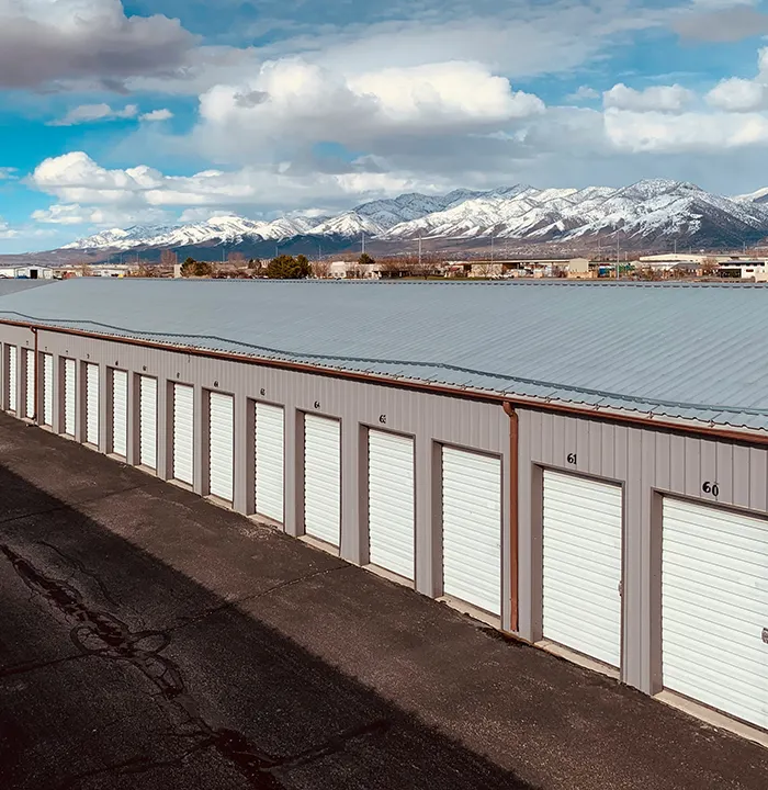 Self storage units in colorado with snow capped peak in background