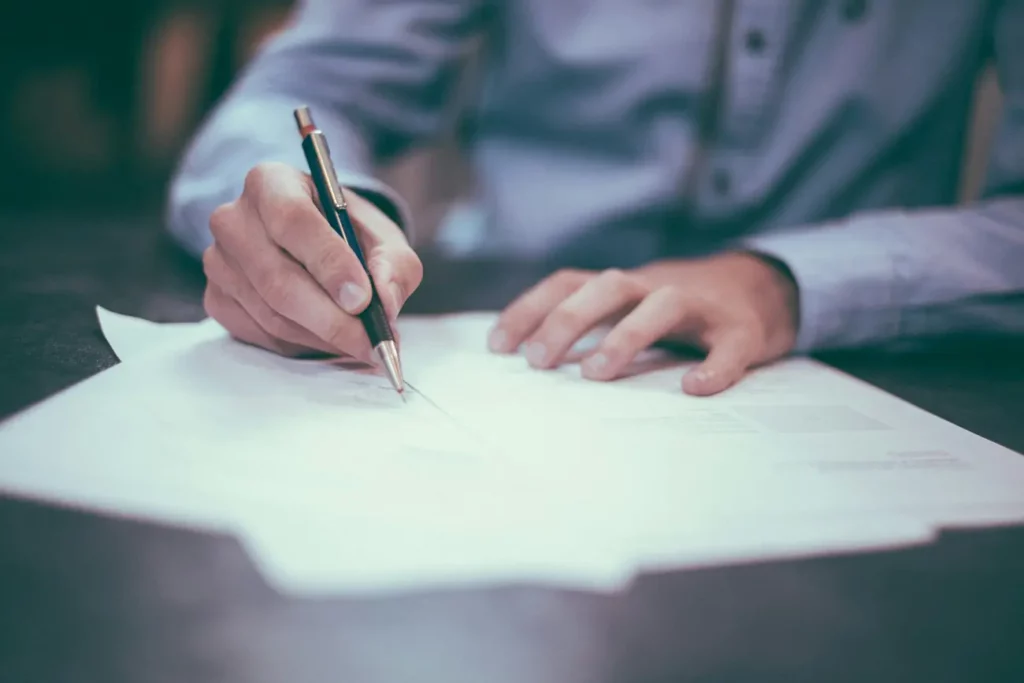 financial records or documents being signed by an accountant before going into storage