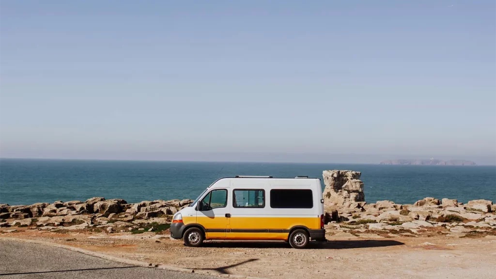 Camper van on the road in front of the KZN ocean near Umhlanga